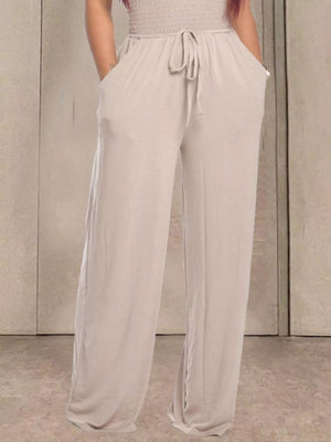 Wide leg pants in beige with drawstring waist and pockets