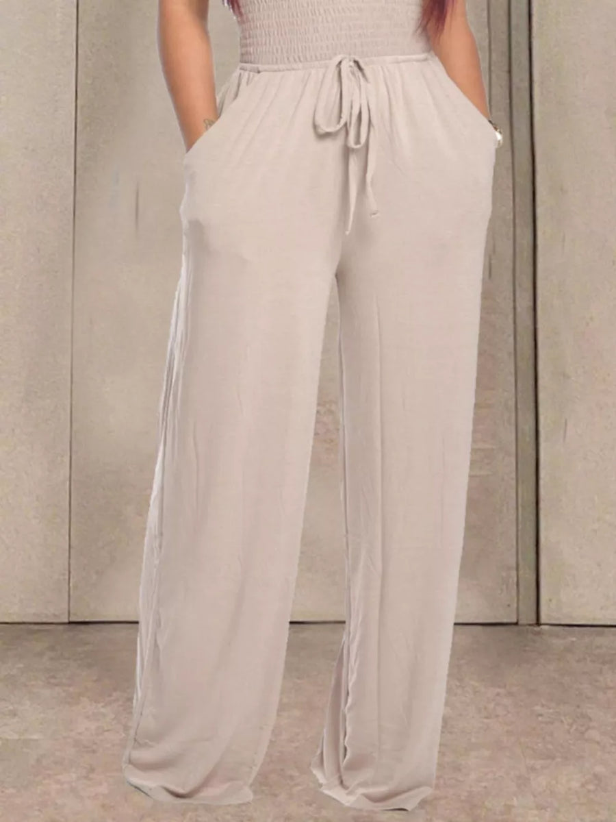 Wide leg pants in beige with drawstring waist and pockets