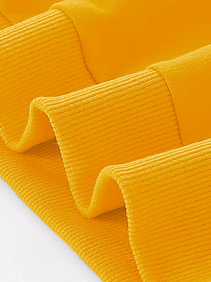 Mustard yellow baby sweatshirt with ribbed texture detail