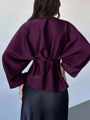 blouse featuring polka dot in black with 100% polyester Care instructions: Machine wash cold texture