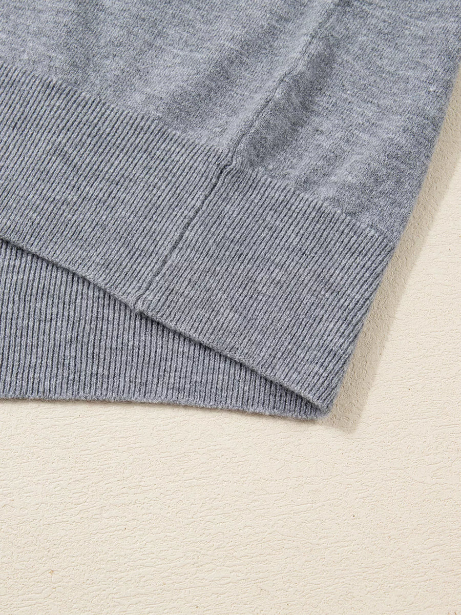Gray ribbed V-neck sweater with ribbed hem detail