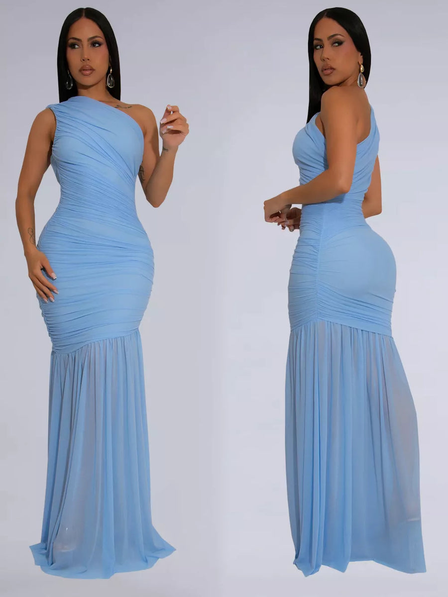 Light blue ruched bodycon maxi dress with one-shoulder neckline and sheer fishtail hem.