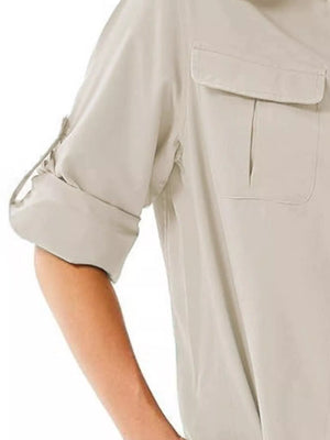Light gray button-up shirt with roll-up sleeves and two chest pockets.