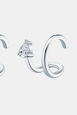 Silver spiral ear cuff with a pear-shaped diamond accent
