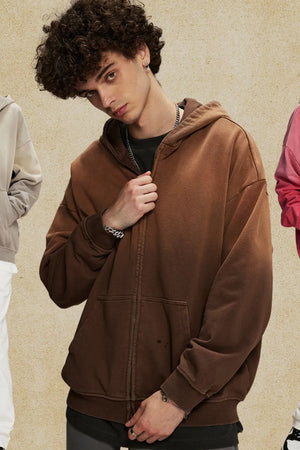 Vintage wash oversized zip-up hoodie in coffee brown with a front pocket.