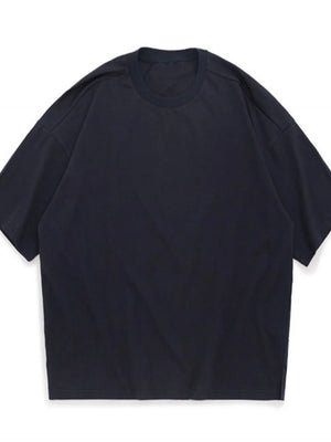 Oversized crew neck t-shirt in dark gray with textured fabric and dropped shoulders.