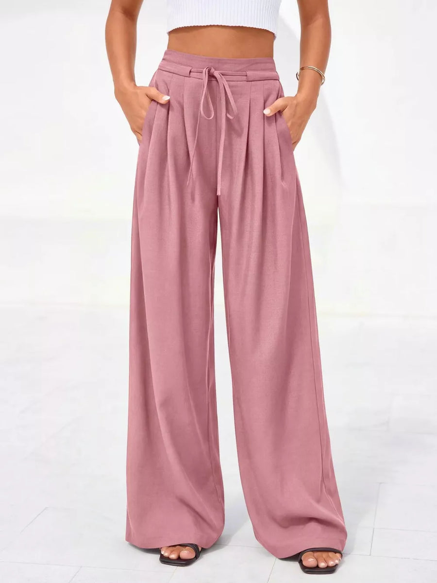 Dusty pink high-waisted pleated wide-leg pants with drawstring and pockets