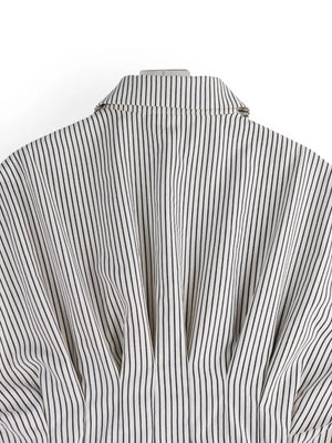 Maternity shirt with black and white vertical stripes, button-down collar detail.