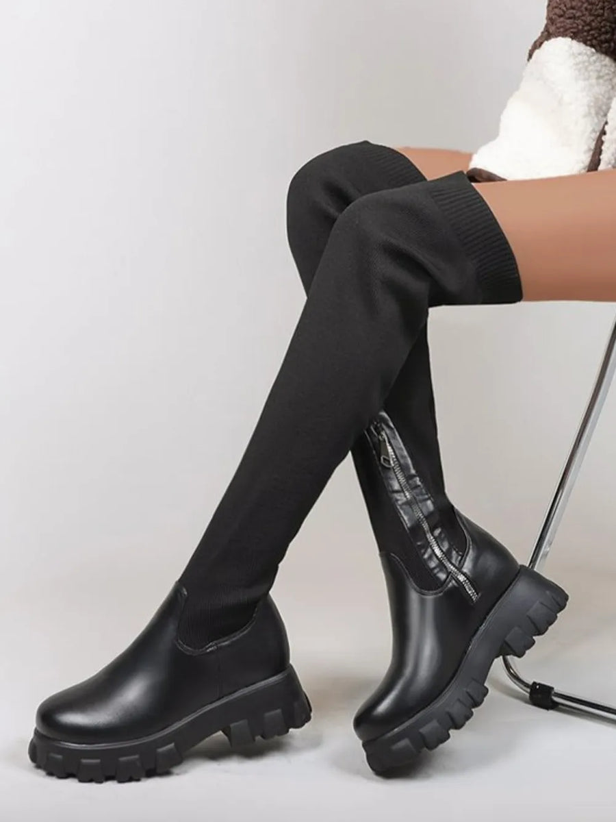 Black knit-top platform over-the-knee boots with side zipper detail.