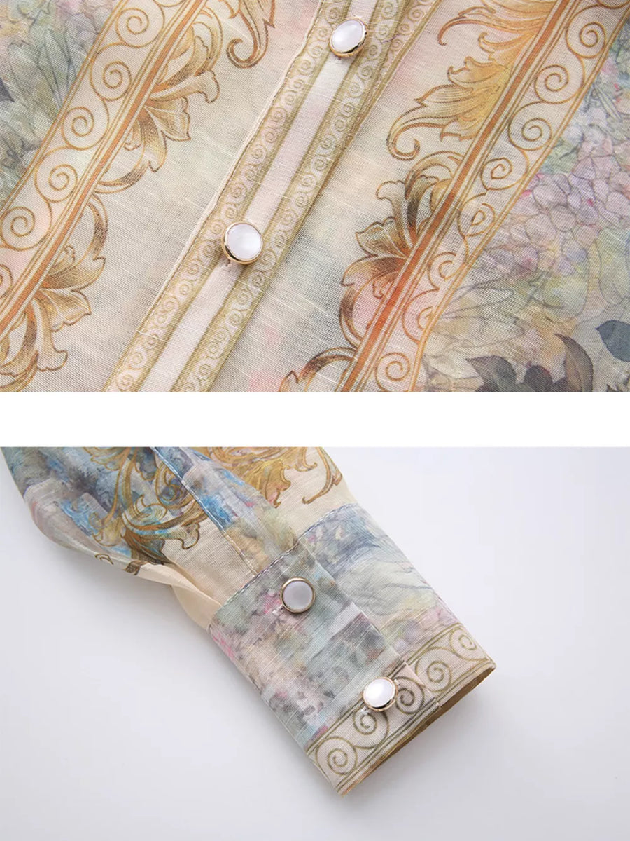 Pastel floral print button-down shirt dress with ornate gold trim and pearl buttons.