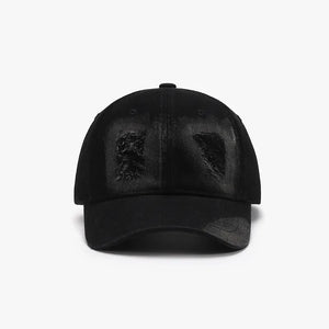 Black distressed denim baseball cap with distressed patches