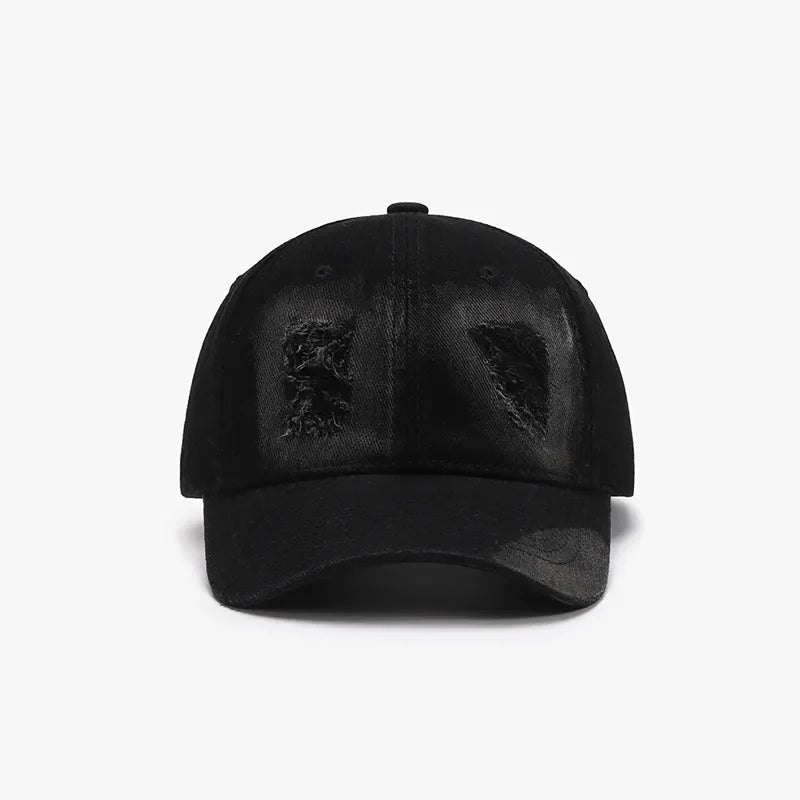 Black distressed denim baseball cap with distressed patches