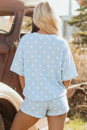 Light blue polka dot relaxed pajama set with short sleeves and shorts.