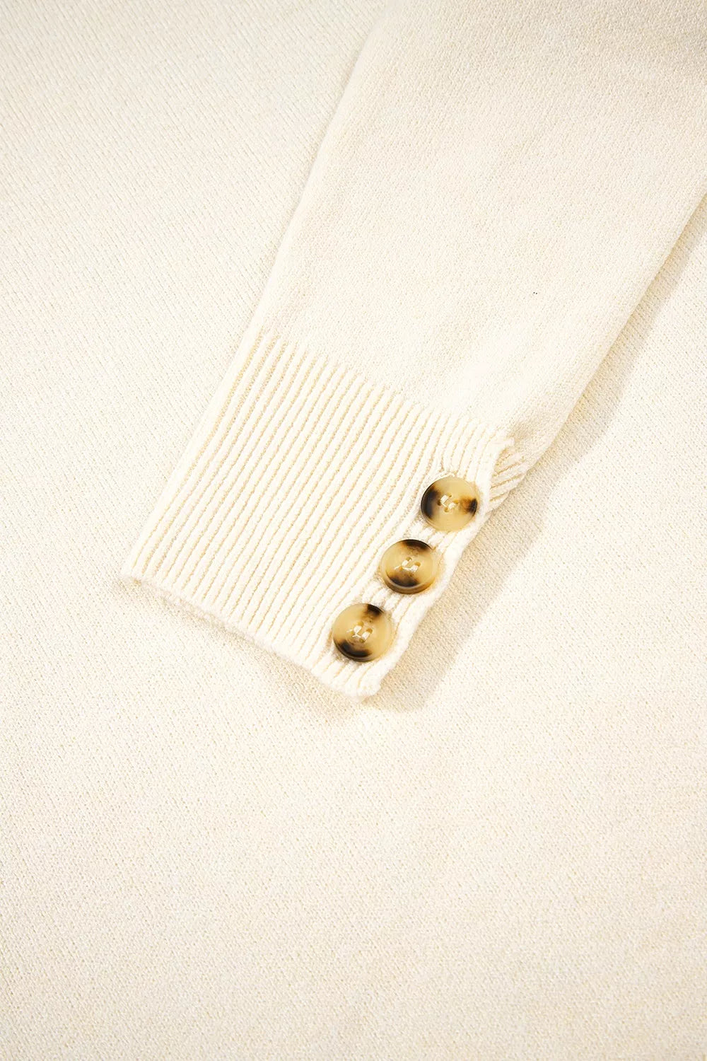 Button-cuff Crew Neck Sweater in White with decorative buttons