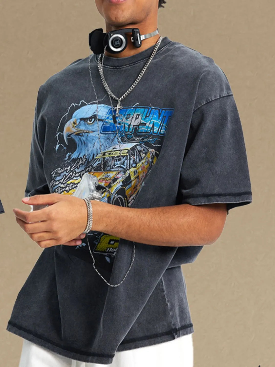Black oversized tee with vintage race graphic and eagle, crew neck, short sleeves.