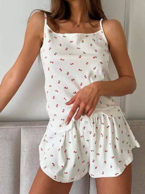 White floral print cami and shorts set with ribbed texture and button detail.