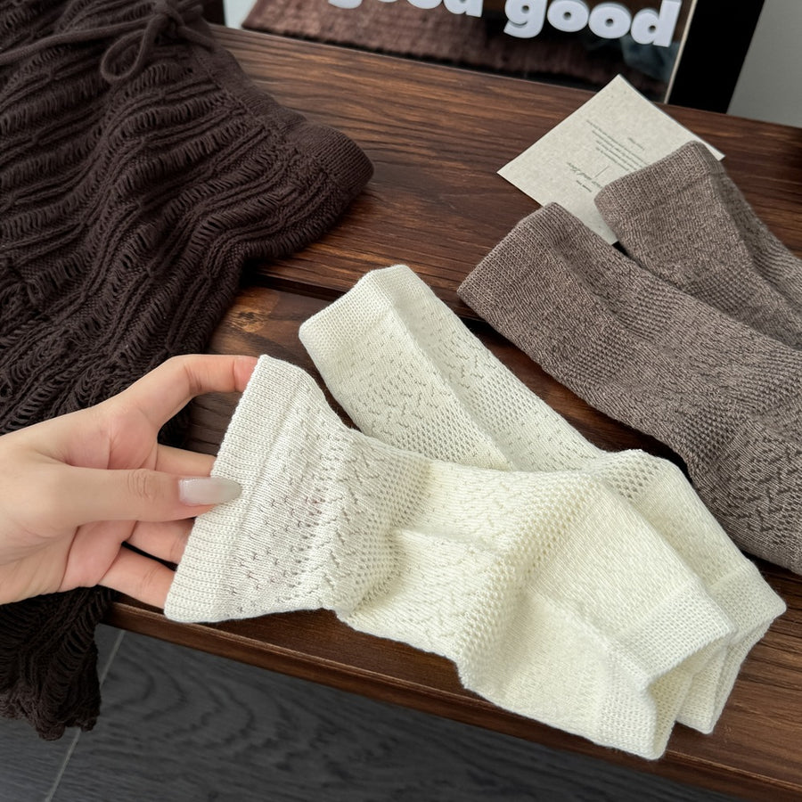 ivory socks with crew-length and elastic