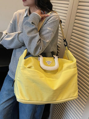 Luxurious Oxford Cloth Duffel Bag in bright yellow with white handle detail and shoulder strap
