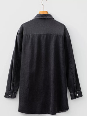 Black denim button-up dress with raw hem and long sleeves.