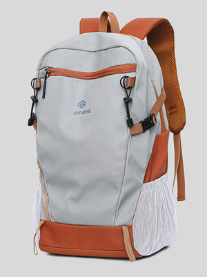 Grey nylon backpack with orange accents and mesh side pockets