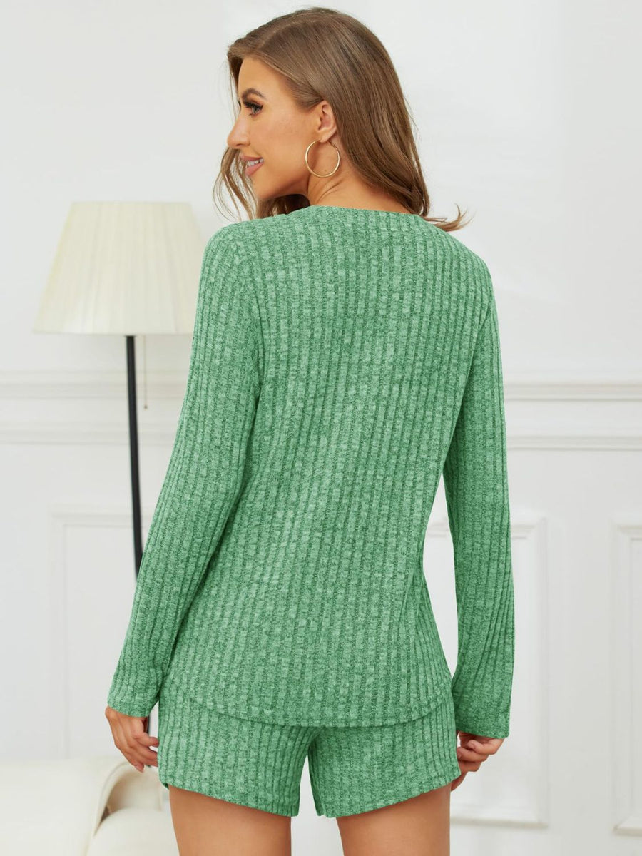 Green ribbed Henley lounge set with long sleeves and shorts.