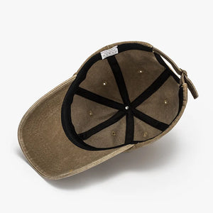 Vintage washed cotton baseball cap in Coffee Brown with adjustable strap and inner label.