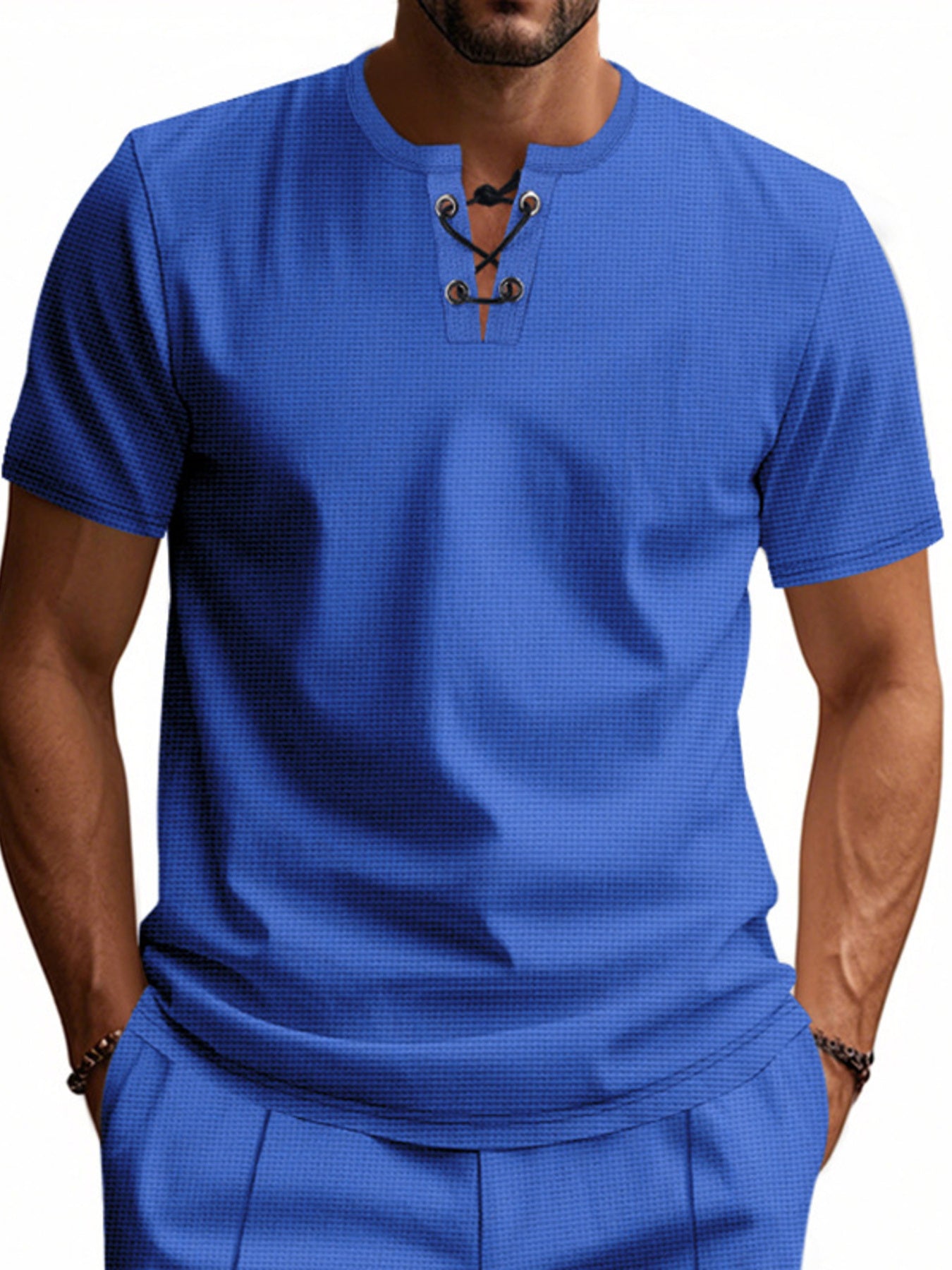 Blue cotton t-shirt for men with waffle texture and lace-up V-neck detail.