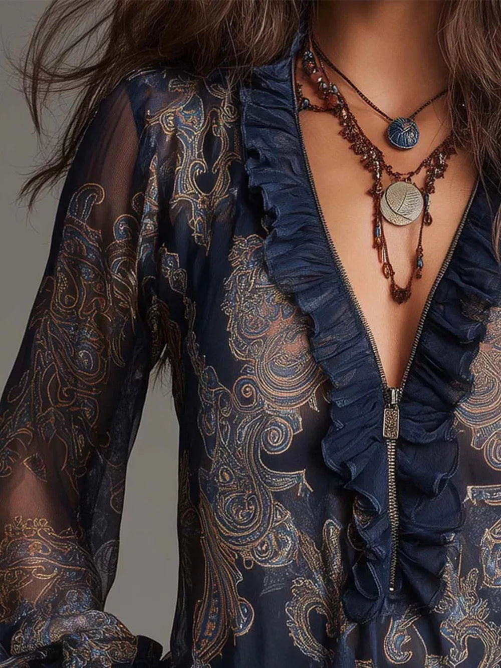 gold blouse featuring frill and paisley