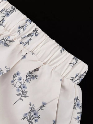 Cream floral print wide-leg pants with elastic waistband
