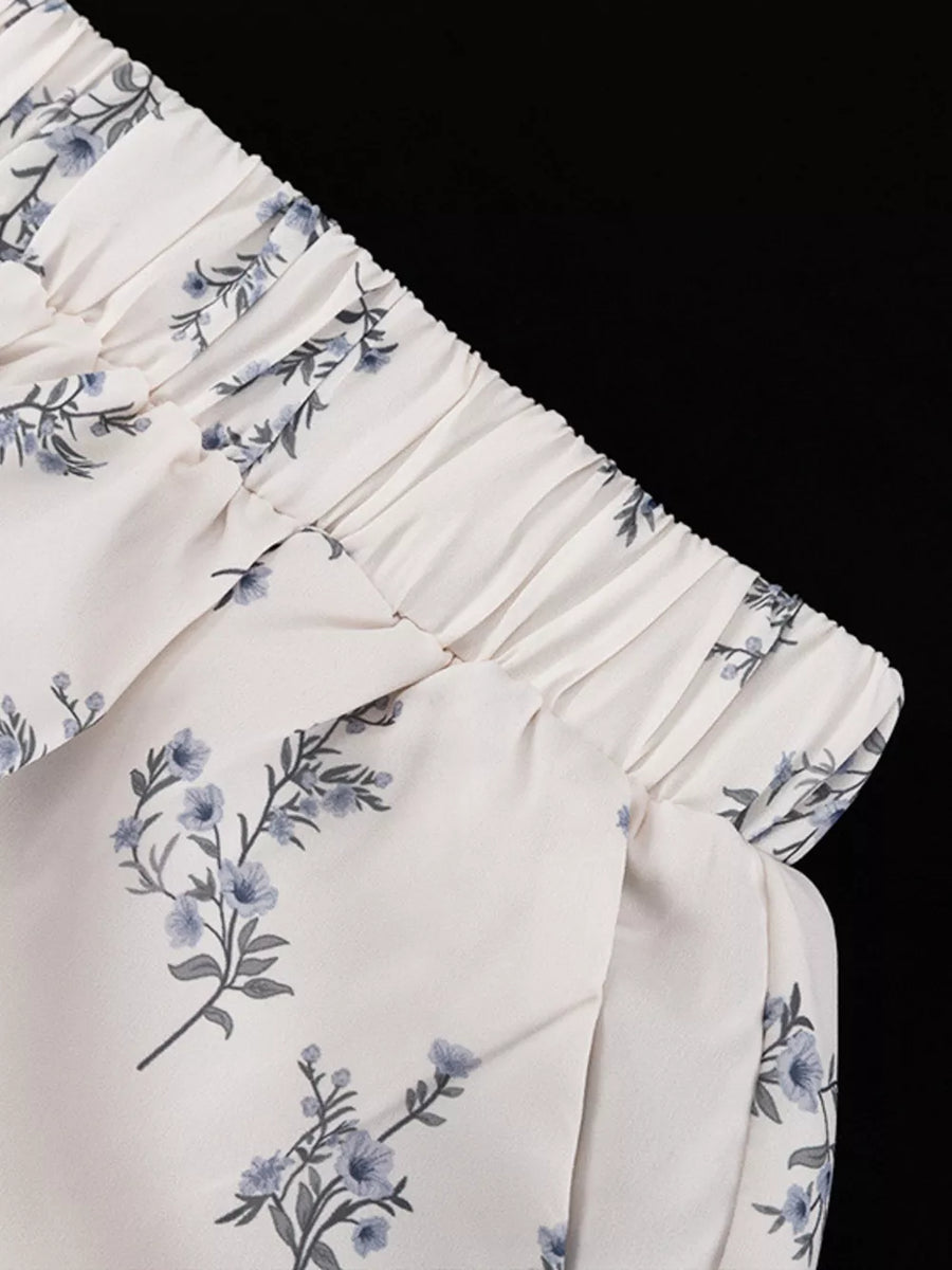 Cream floral print wide-leg pants with elastic waistband