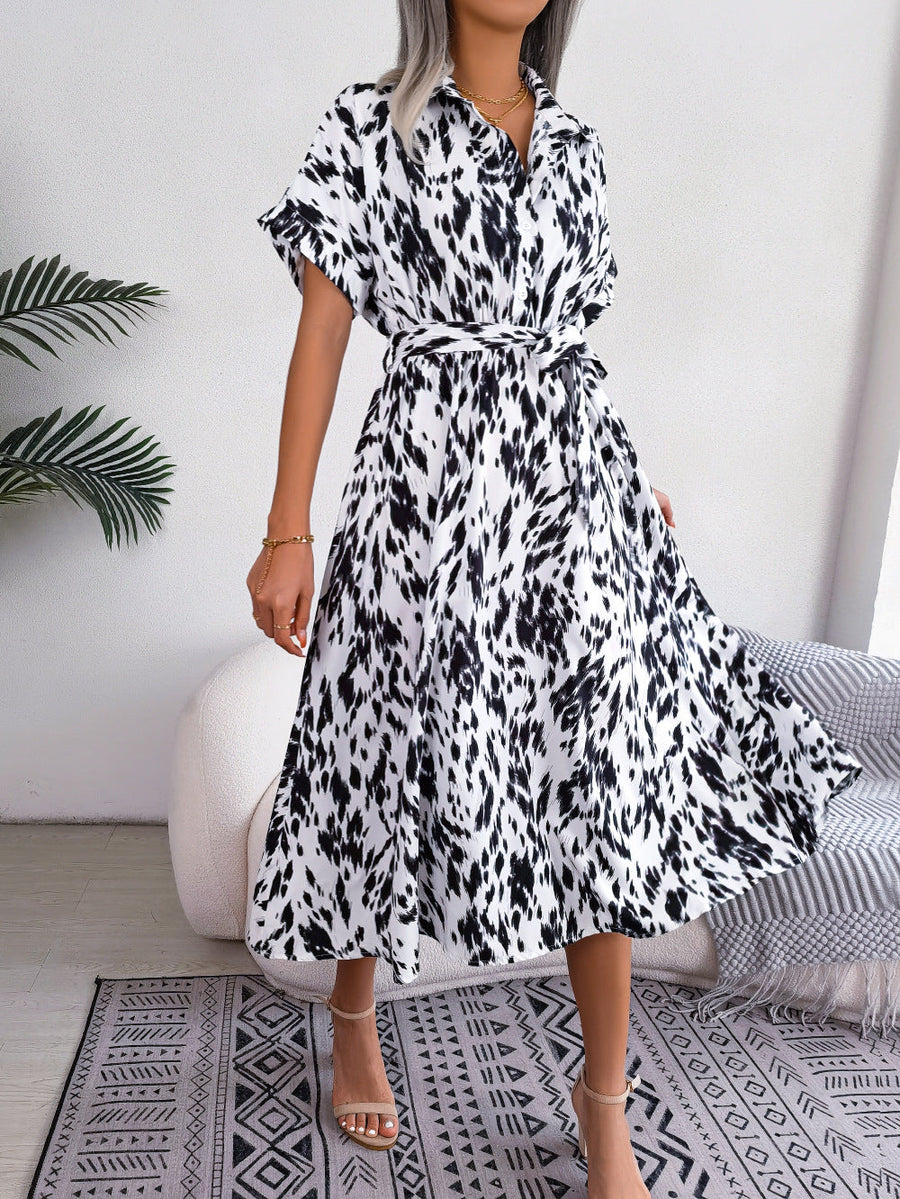 Dalmatian print midi shirt dress in white with short sleeves and a tie waist.