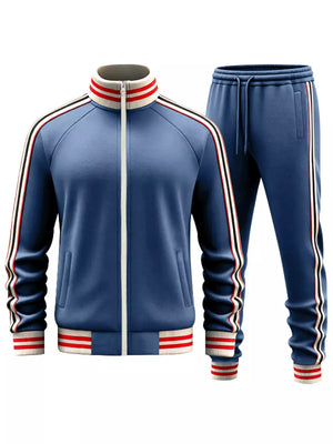 French blue tracksuit with red and white striped collar, cuffs, and side stripes.