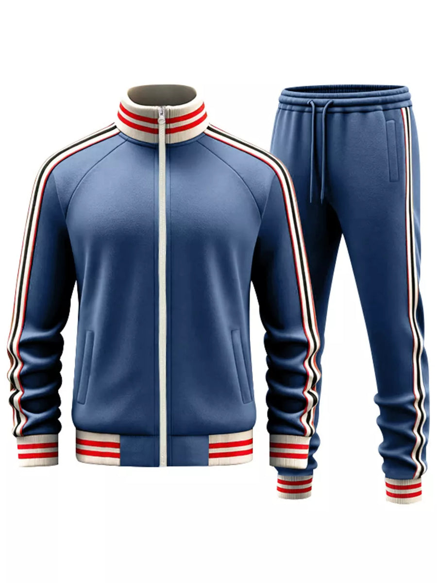 French blue tracksuit with red and white striped collar, cuffs, and side stripes.
