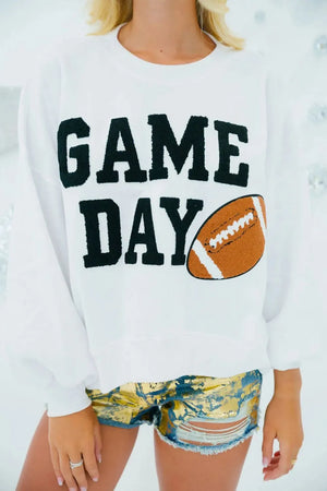 White graphic sweatshirt with black "GAME DAY" text and football graphic