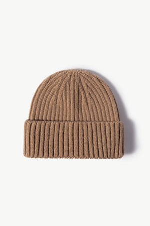 Chunky ribbed knit beanie in brown acrylic with a cuffed hem.