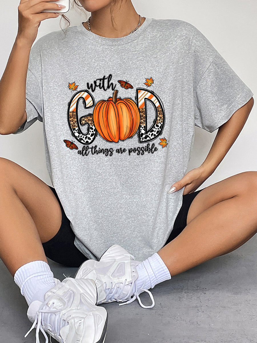 Grey graphic t-shirt with pumpkin and leopard print "GOD" text and butterflies.