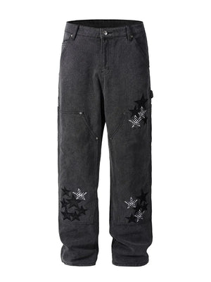 Dark embroidered star carpenter jeans with checkered pattern details.