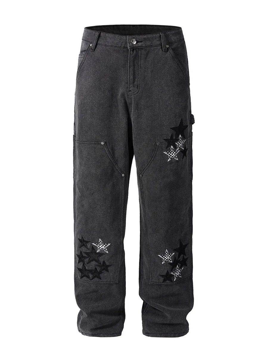 Dark embroidered star carpenter jeans with checkered pattern details.