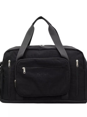 Black canvas duffel bag with multiple zippered pockets and grey straps.