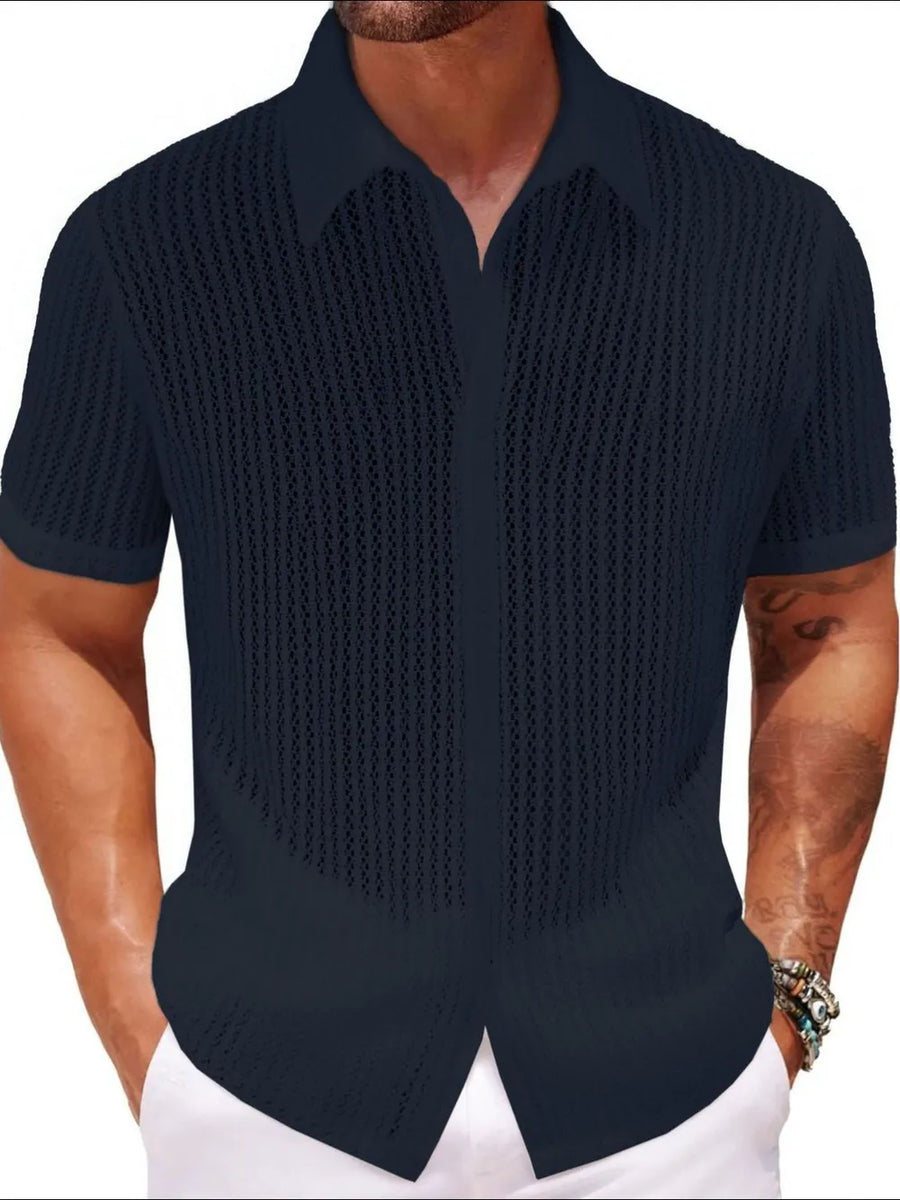 Navy open-knit resort shirt with short sleeves and a button-up collar.