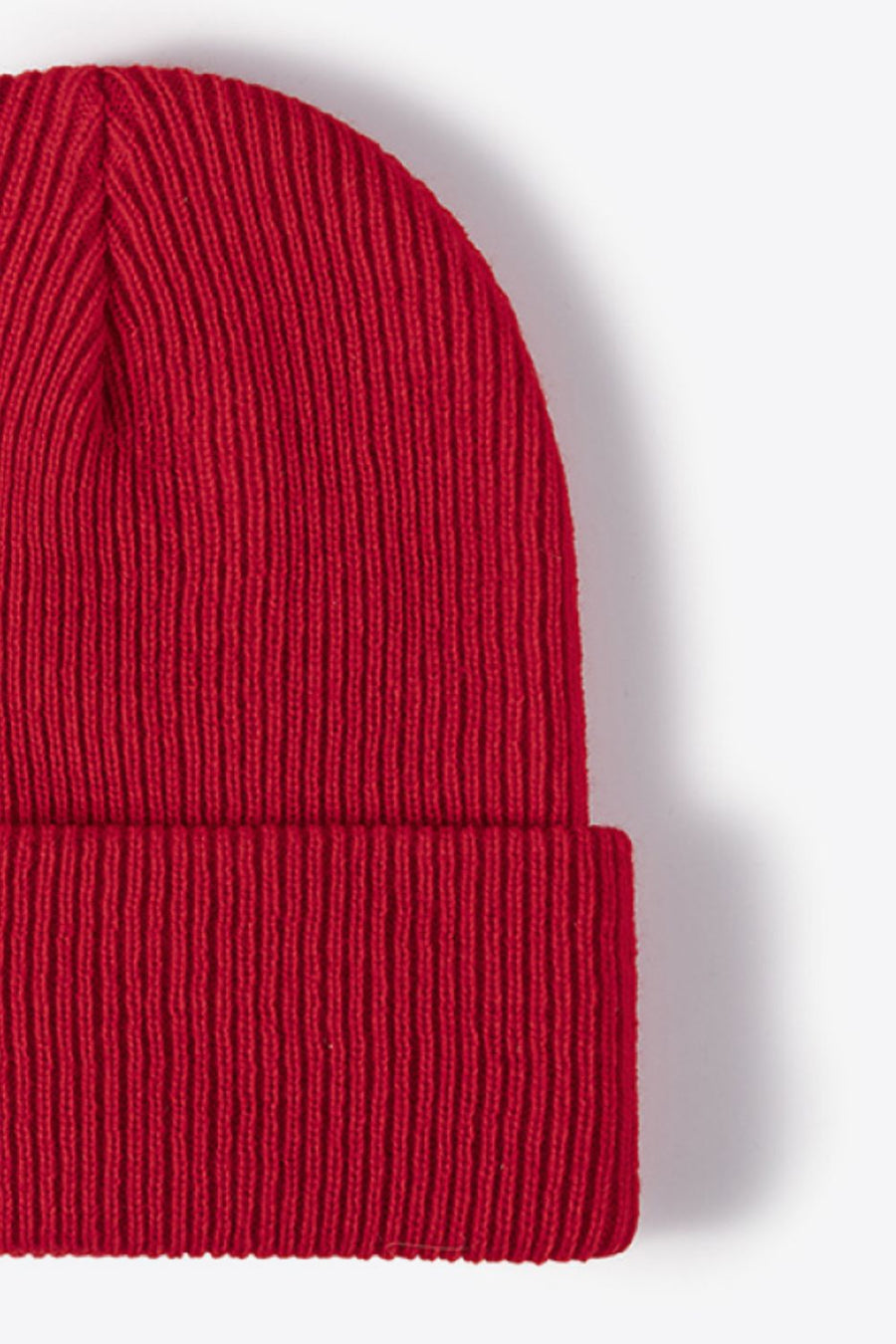 Red ribbed knit beanie with a folded cuff