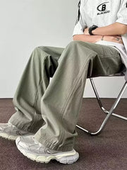 Men's green wide-leg cargo pants with a relaxed fit and visible stitching detail.