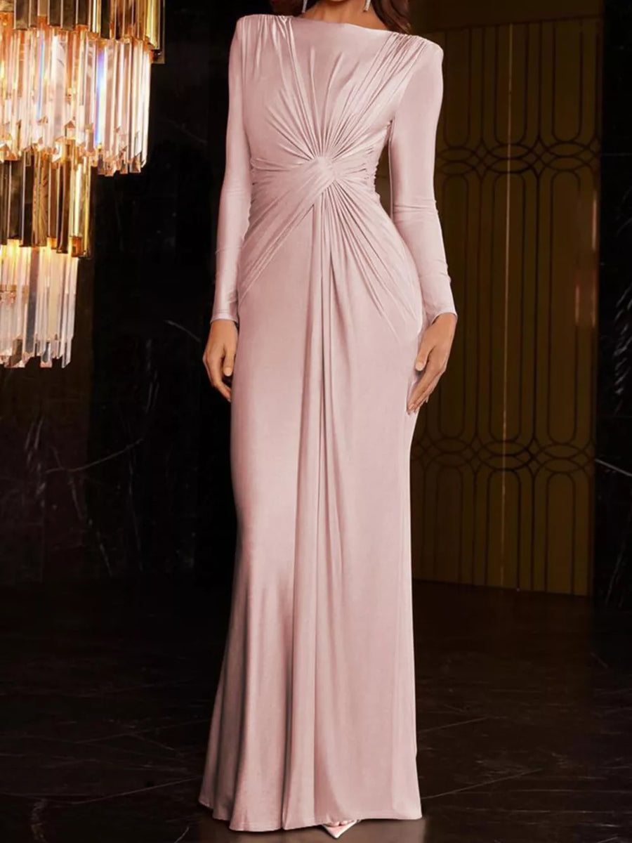 Pink ruched long sleeve maxi dress with boat neckline and bodycon fit.