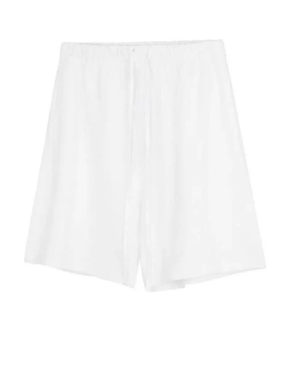 White jogger shorts with drawstring waist and relaxed fit.