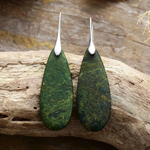 Silver and green stone grain teardrop dangle earrings with unique marbled pattern.