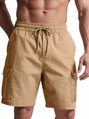 Tan cargo shorts with elastic waistband, drawstring, and flap pockets.