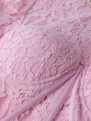 Pink lace midi dress with sheer sleeves and corset detail