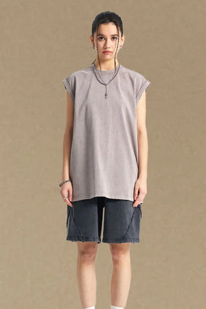 Washed cotton muscle tee in gray, relaxed fit, sleeveless with raw hem.