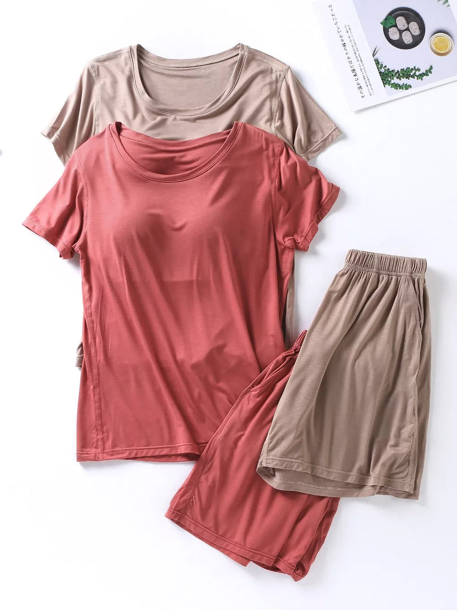 Two-piece pajama set with crewneck tops and shorts in Windsor Red and Milk Tea Camel, featuring pockets and elastic
