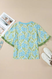 Floral ruffled half sleeve maternity blouse with blue and green floral print